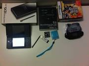 Black Nintendo DS Lite with R4 card and Guitar Hero
